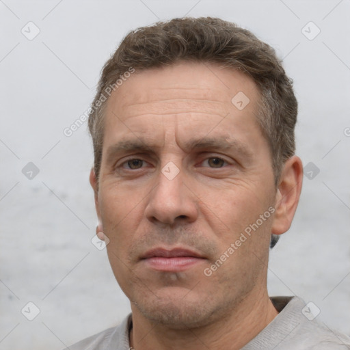 Neutral white adult male with short  brown hair and brown eyes