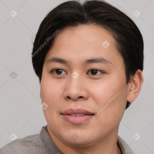 Joyful asian young-adult female with short  brown hair and brown eyes