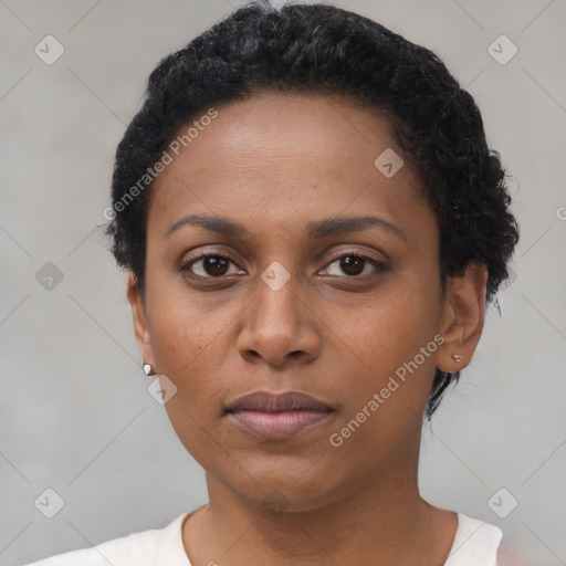 Neutral black young-adult female with short  black hair and brown eyes