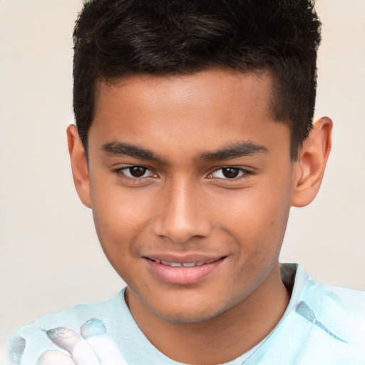 Joyful white child male with short  brown hair and brown eyes