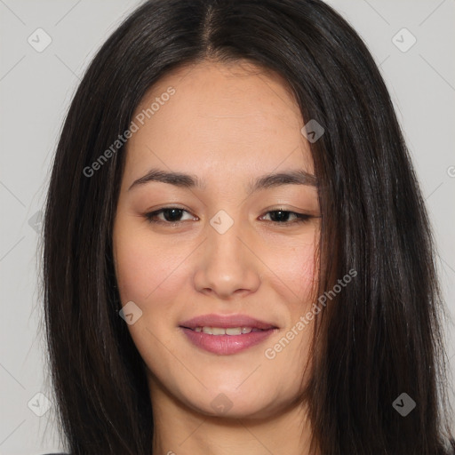 Joyful asian young-adult female with long  brown hair and brown eyes