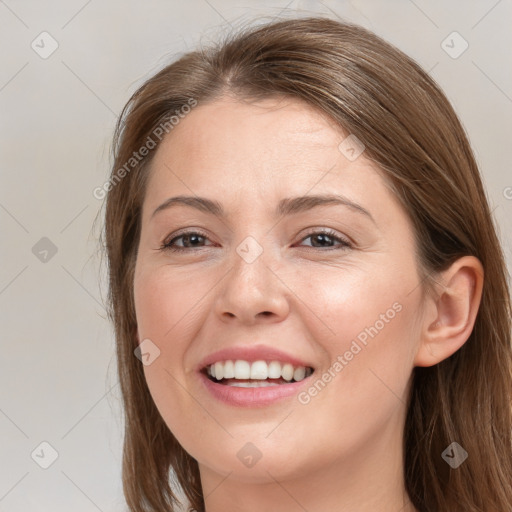 Joyful white young-adult female with long  brown hair and grey eyes