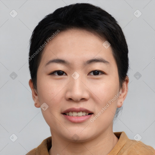 Joyful asian young-adult female with short  black hair and brown eyes