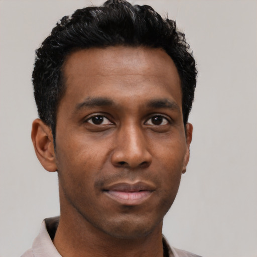 Neutral black young-adult male with short  black hair and brown eyes