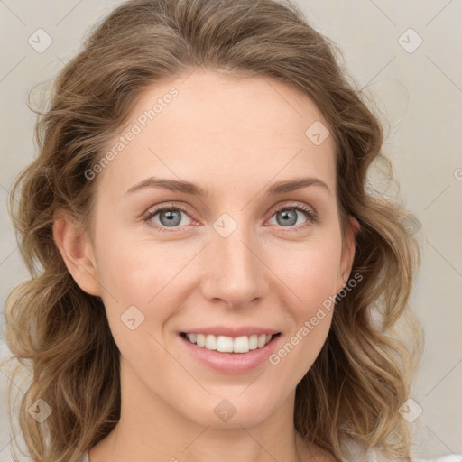 Joyful white young-adult female with medium  brown hair and blue eyes