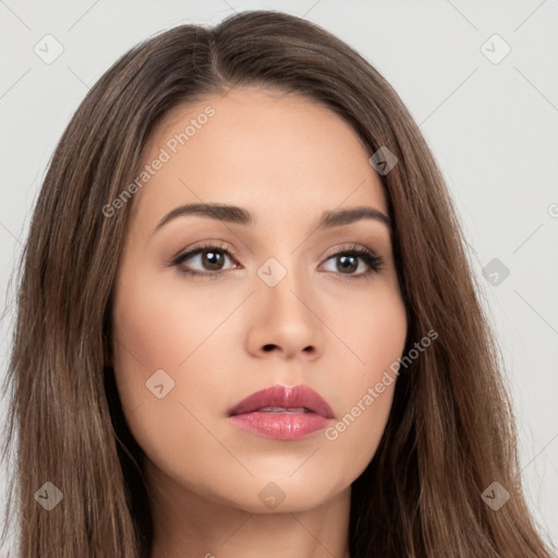 Neutral white young-adult female with long  brown hair and brown eyes