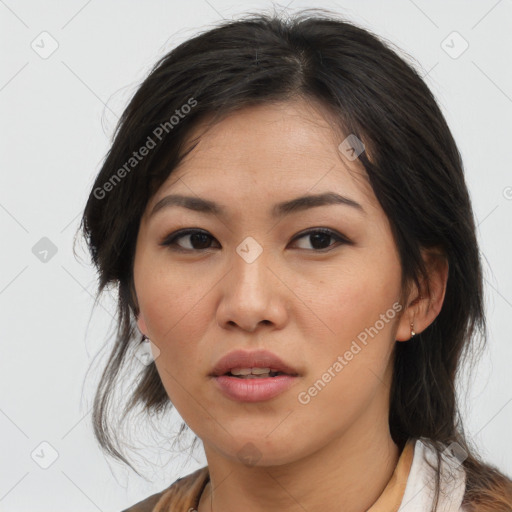 Joyful asian young-adult female with medium  brown hair and brown eyes