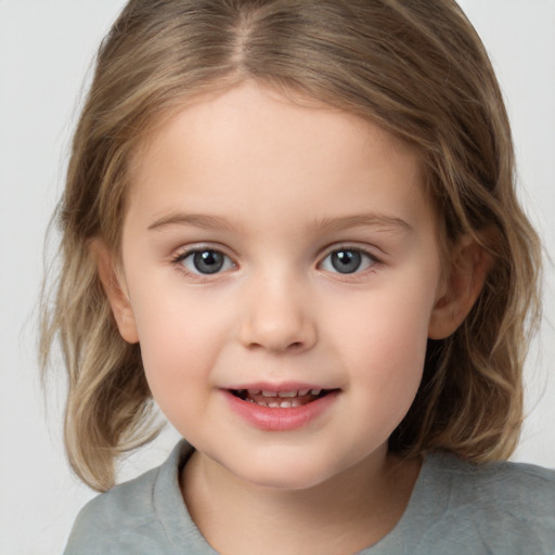 Joyful white child female with medium  brown hair and brown eyes