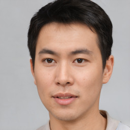 Neutral asian young-adult male with short  brown hair and brown eyes