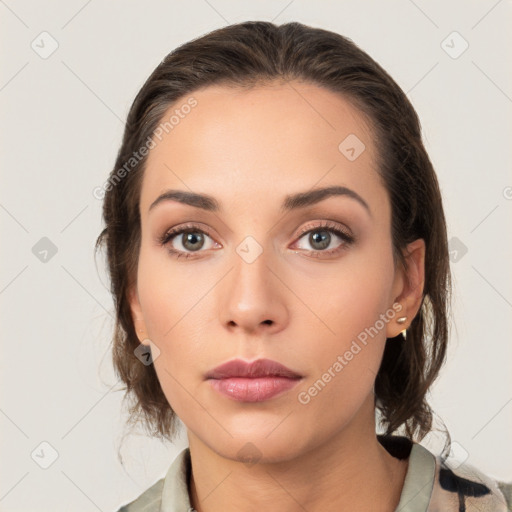 Neutral white young-adult female with medium  brown hair and brown eyes