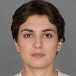 Neutral white young-adult female with short  brown hair and brown eyes