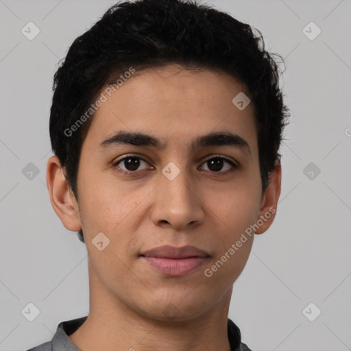 Joyful latino young-adult male with short  brown hair and brown eyes