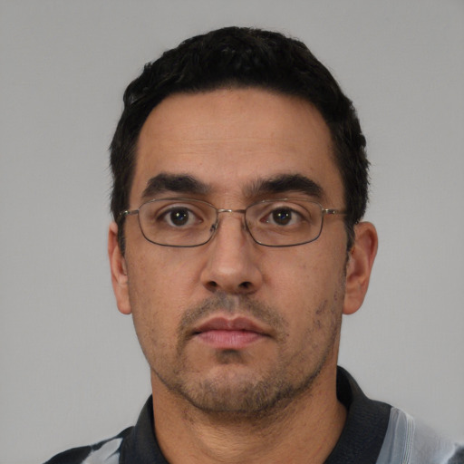 Neutral white adult male with short  black hair and brown eyes