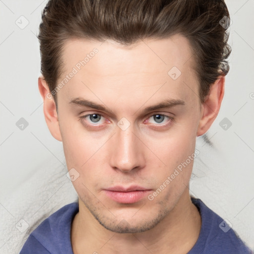 Neutral white young-adult male with short  brown hair and brown eyes