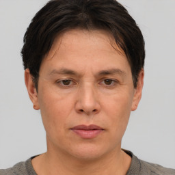 Neutral white adult male with short  brown hair and brown eyes