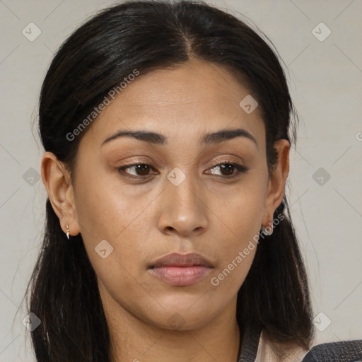 Neutral latino young-adult female with medium  brown hair and brown eyes