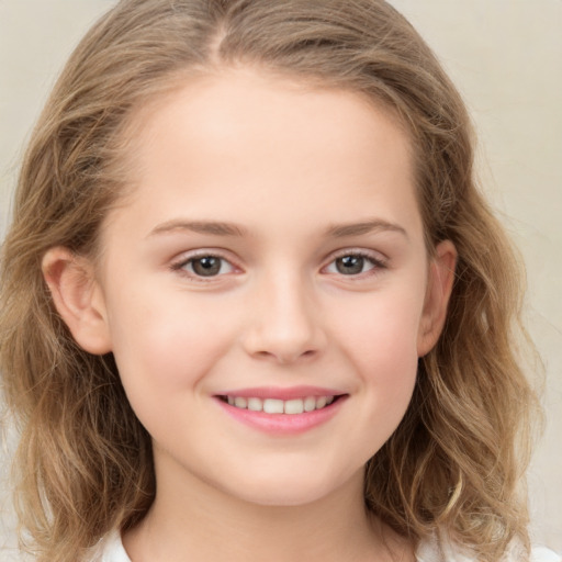 Joyful white child female with medium  brown hair and grey eyes