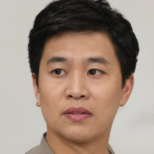 Neutral asian young-adult male with short  black hair and brown eyes
