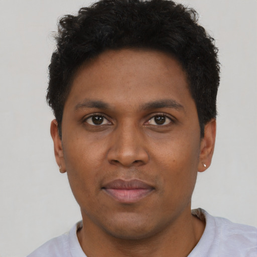 Neutral black young-adult male with short  brown hair and brown eyes