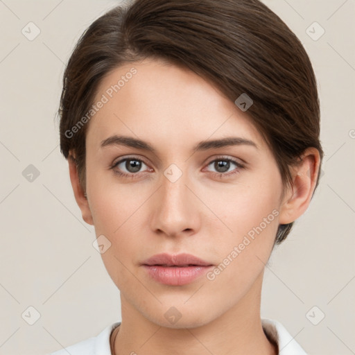 Neutral white young-adult female with short  brown hair and brown eyes