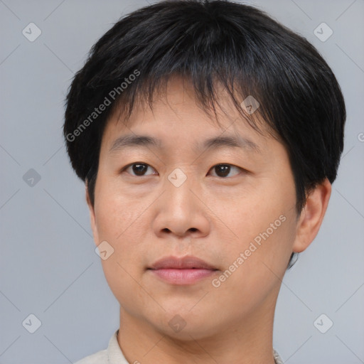 Neutral asian young-adult male with short  brown hair and brown eyes