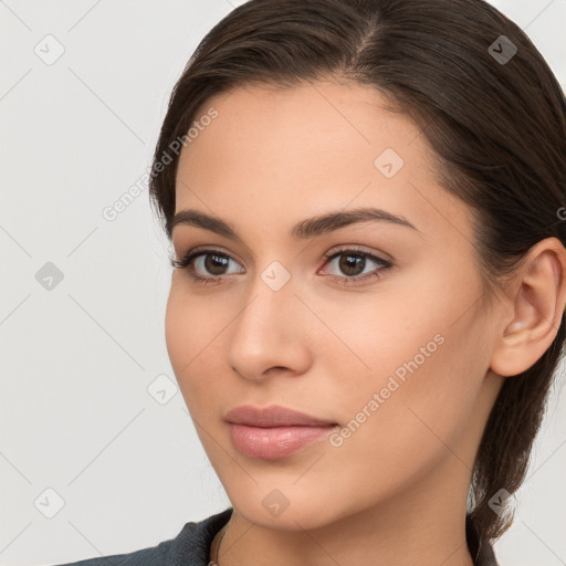 Neutral white young-adult female with long  brown hair and brown eyes