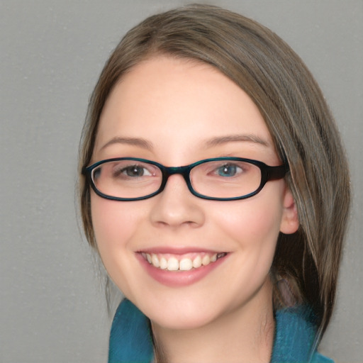 Joyful white young-adult female with medium  brown hair and blue eyes