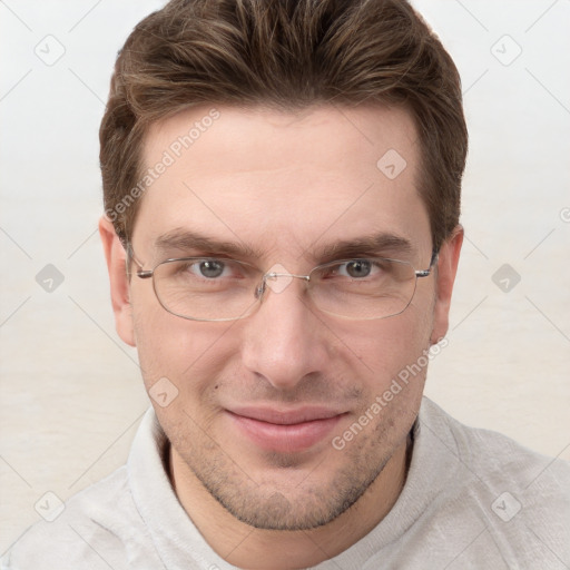 Joyful white adult male with short  brown hair and grey eyes