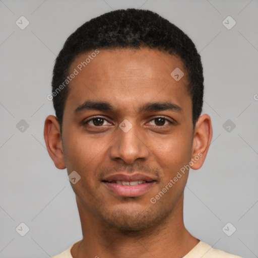 Joyful latino young-adult male with short  brown hair and brown eyes