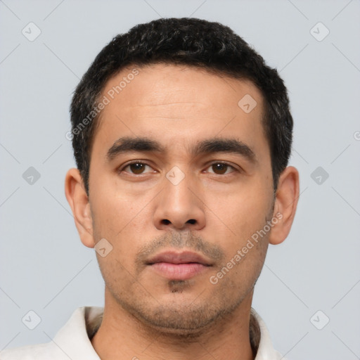 Neutral latino young-adult male with short  black hair and brown eyes