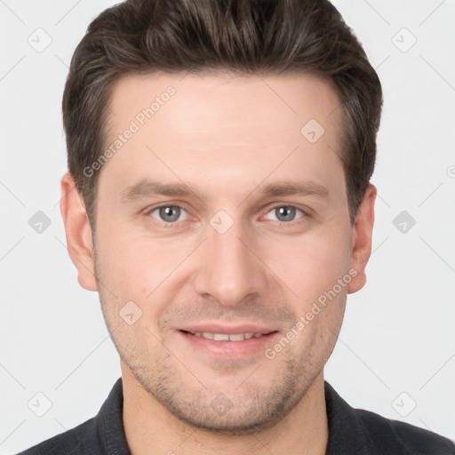 Joyful white young-adult male with short  brown hair and brown eyes