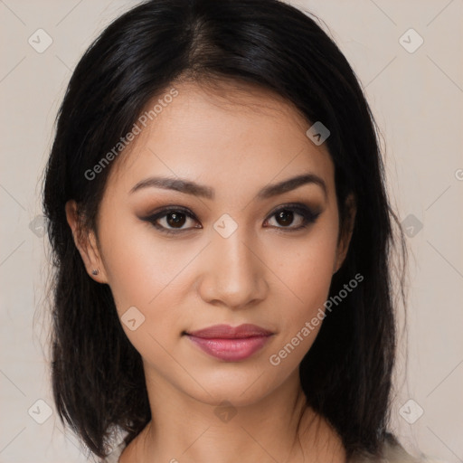 Joyful latino young-adult female with medium  brown hair and brown eyes