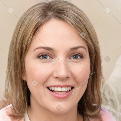 Joyful white young-adult female with medium  brown hair and green eyes