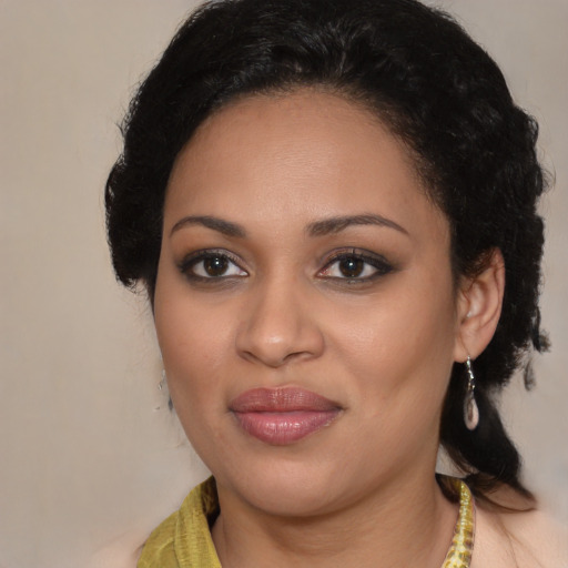 Joyful black young-adult female with medium  brown hair and brown eyes