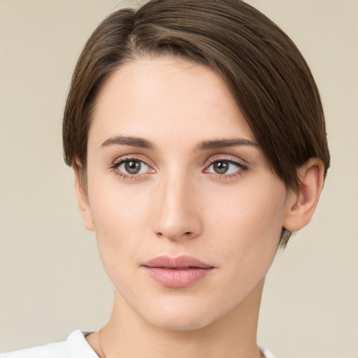 Neutral white young-adult female with short  brown hair and green eyes