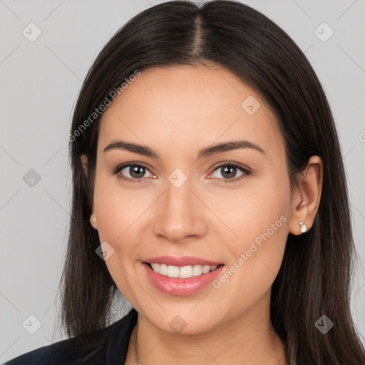 Joyful white young-adult female with long  brown hair and brown eyes