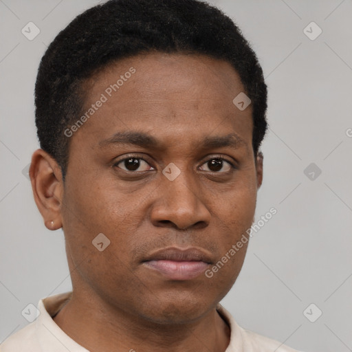 Neutral latino young-adult male with short  brown hair and brown eyes