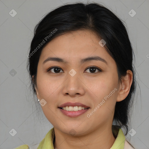 Joyful asian young-adult female with medium  brown hair and brown eyes