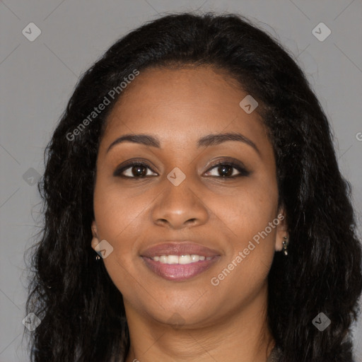 Joyful black young-adult female with long  brown hair and brown eyes