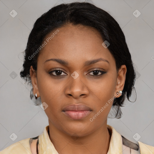 Joyful black young-adult female with medium  black hair and brown eyes