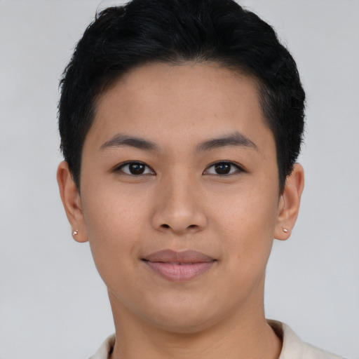Joyful asian young-adult female with short  black hair and brown eyes