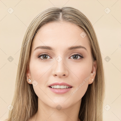 Joyful white young-adult female with long  brown hair and brown eyes