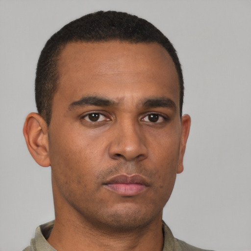 Neutral latino young-adult male with short  brown hair and brown eyes