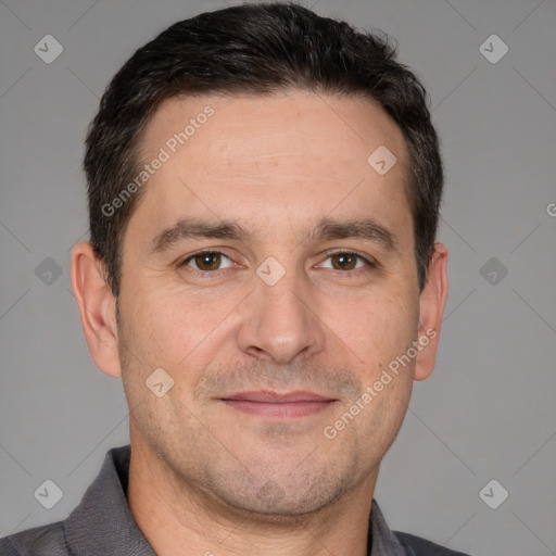 Joyful white adult male with short  brown hair and brown eyes