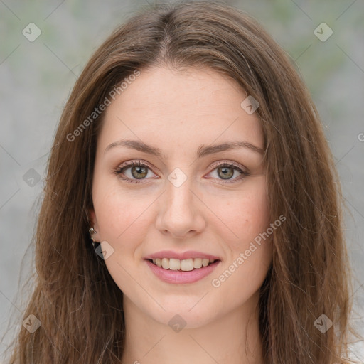 Joyful white young-adult female with long  brown hair and green eyes