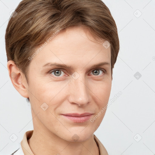 Joyful white young-adult female with short  brown hair and grey eyes