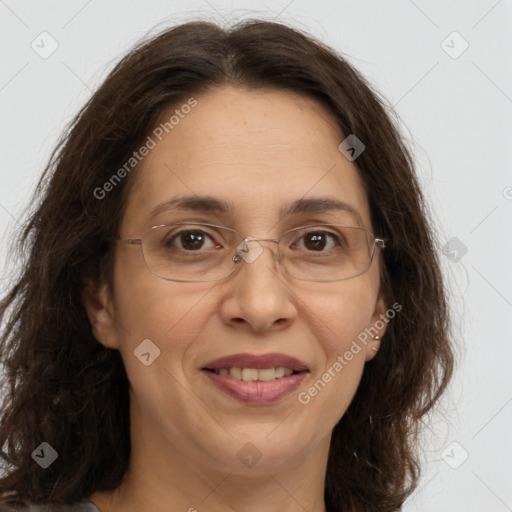 Joyful white adult female with long  brown hair and brown eyes