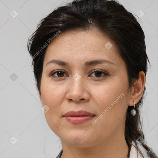 Joyful white adult female with medium  brown hair and brown eyes