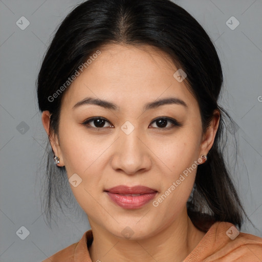 Joyful latino young-adult female with medium  brown hair and brown eyes