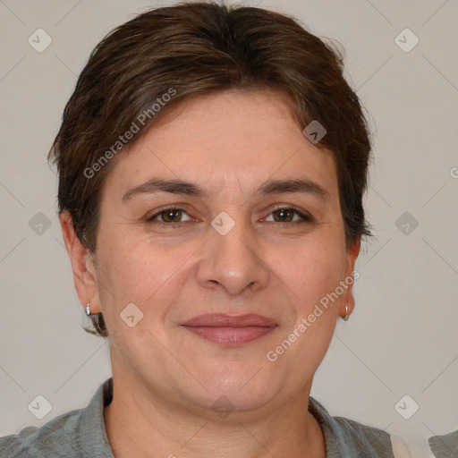 Joyful white adult female with short  brown hair and brown eyes